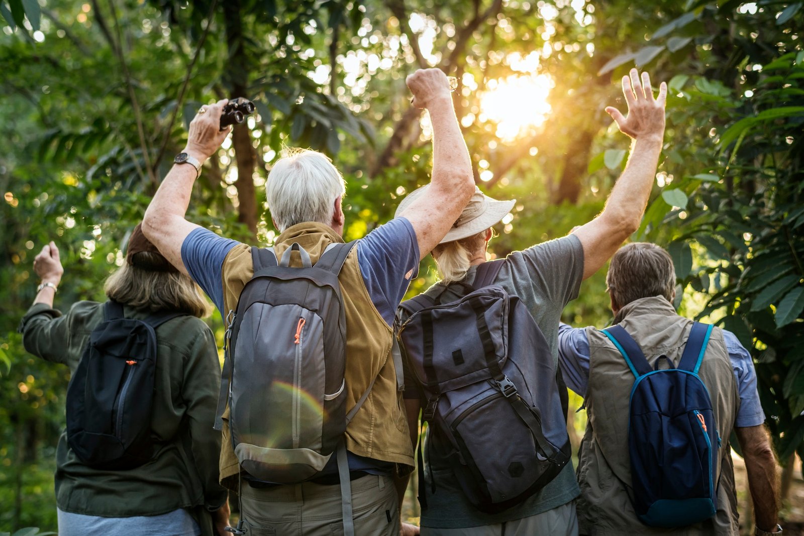 group-of-senior-adults-trekking-in-the-forest.jpg